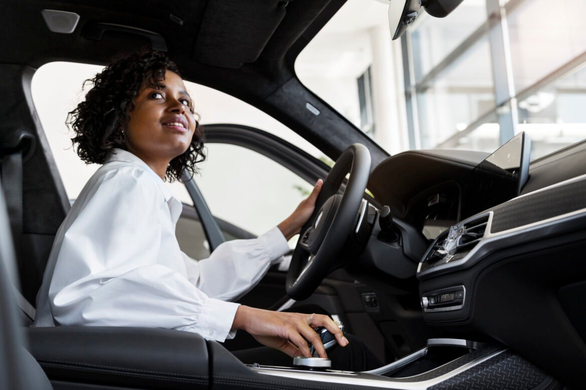 woman-enjoying-her-financially-independence-while-buying-car (1)