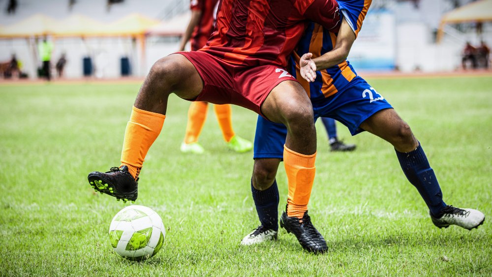 soccer-players-action-stadium-during-match